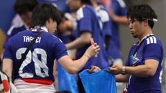 Source-feed image associated with Do it at home too, women tell Japanese fans who cleaned World Cup stadium