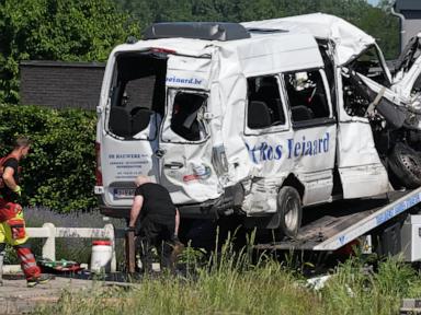 Source-feed image associated with 4 dead, 5 hurt in a crash between a train and a school bus, Belgian officials say