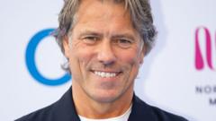 Source-feed image associated with John Bishop cancels shows after motorbike accident with Tim Peake