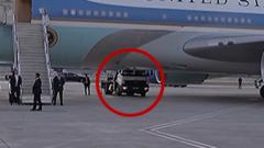 Source-feed image associated with Watch: Was Trump smuggled out of Air Force One in a catering truck?
