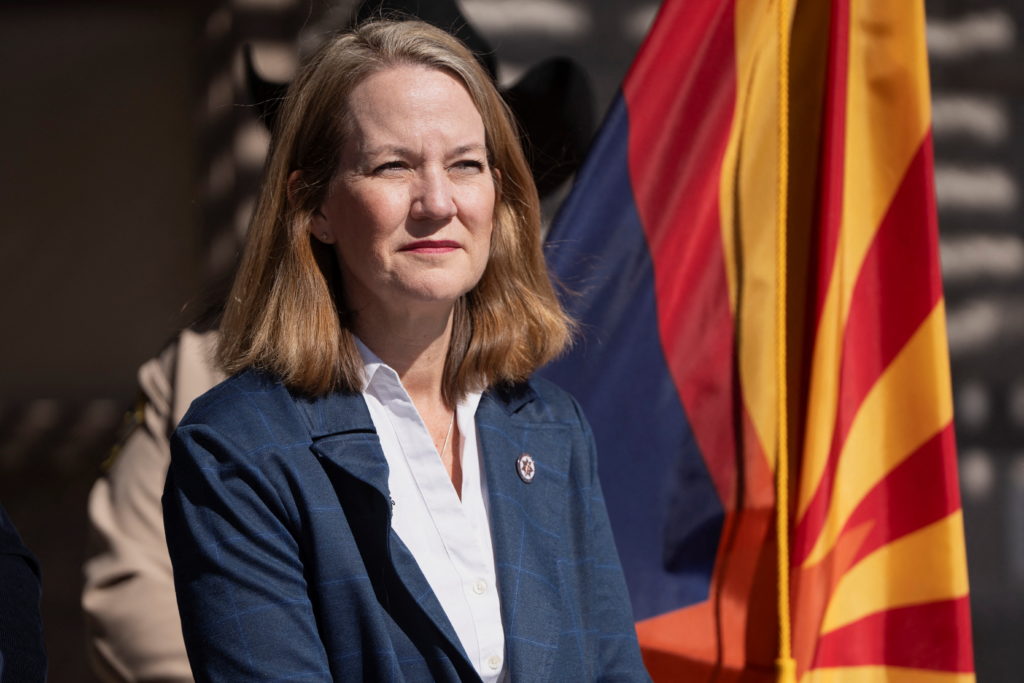 Source-feed image associated with Arizona prosecutors dismissing fake elector case but vow to seek new indictment
