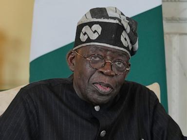 Source-feed image associated with Nigerian president hails 'largest ever' single-day rescue as 308 abductees freed