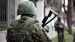 Source-feed image associated with Soldier kills four in gun rampage in Russian-occupied Crimea