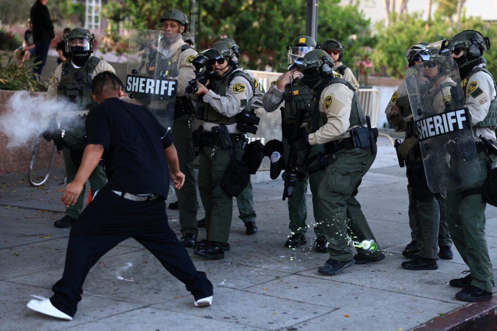 Source-feed image associated with AP analysis: Justice Department went after protesters for felony assault, but juries and judges were unconvinced