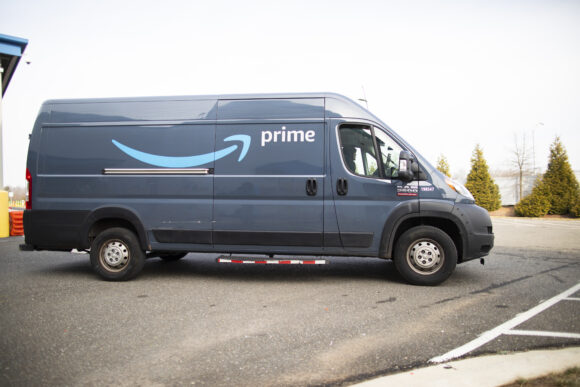 Source-feed image associated with New Jersey Sues Amazon Alleging Poor Pay and Conditions for Drivers