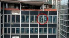 Source-feed image associated with Watch: Buckling support beams seen inside New York high-rise