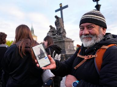 Image from linked report: Depeche Mode fans flock to Prague’s Charles Bridge to recreate 1988 band photo