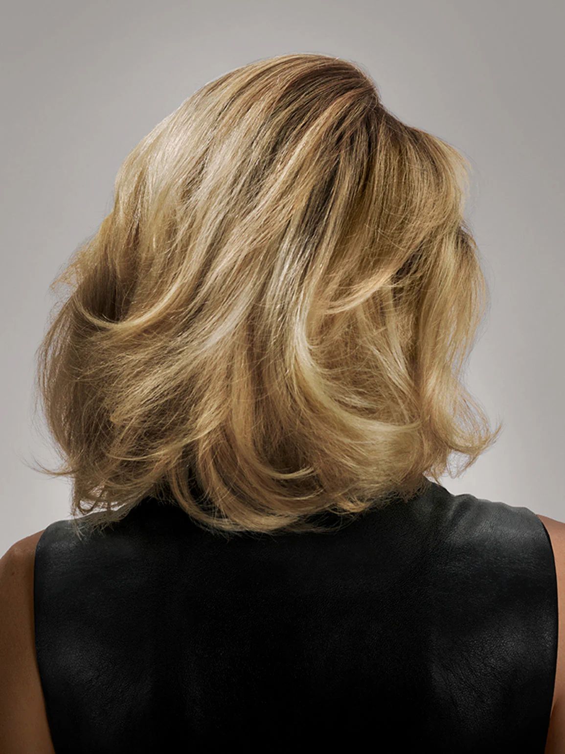 Source-feed image associated with 8 Best Shampoos for Frizzy Hair, According to Hair Stylists and Vogue Editors