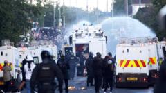 Source-feed image associated with Water cannon fired in latest disorder after Belfast knife attack