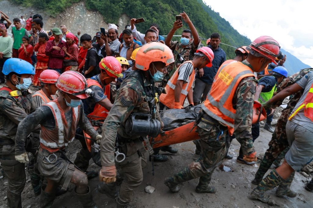 Source-feed image associated with News Wrap: 2 men rescued from Nepal tunnel 9 days after catastrophic flood