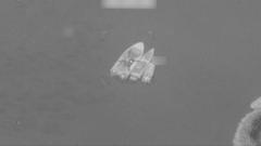 Source-feed image associated with US strikes target Iranian military boats