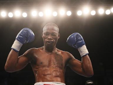 Source-feed image associated with South African police arrest 4 in the killing of former champion boxer Zolani Tete