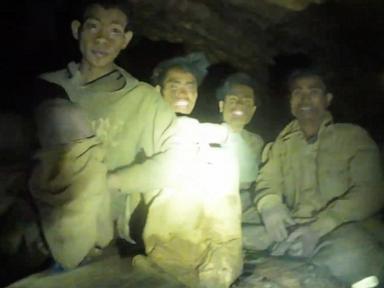 Source-feed image associated with Rescuers work to drain flooded Laos cave to free 5 villagers, search for 2 missing