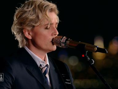Source-feed image associated with WATCH: Brandi Carlile performs 'America the Beautiful' at the Statue of Liberty
