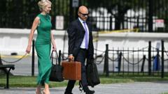 Source-feed image associated with Trump gave $45,000 cash gifts to Natalie Harp and two other aides, public records show