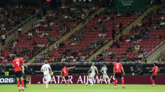Source-feed image associated with Fans on concourses instead of in seats, claims Fifa