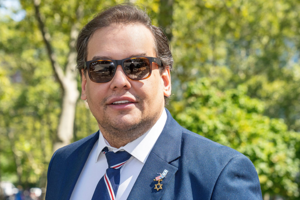 Source-feed image associated with Kalshi permanently bans ex-Congressman George Santos for life after concluding he likely was insider trading