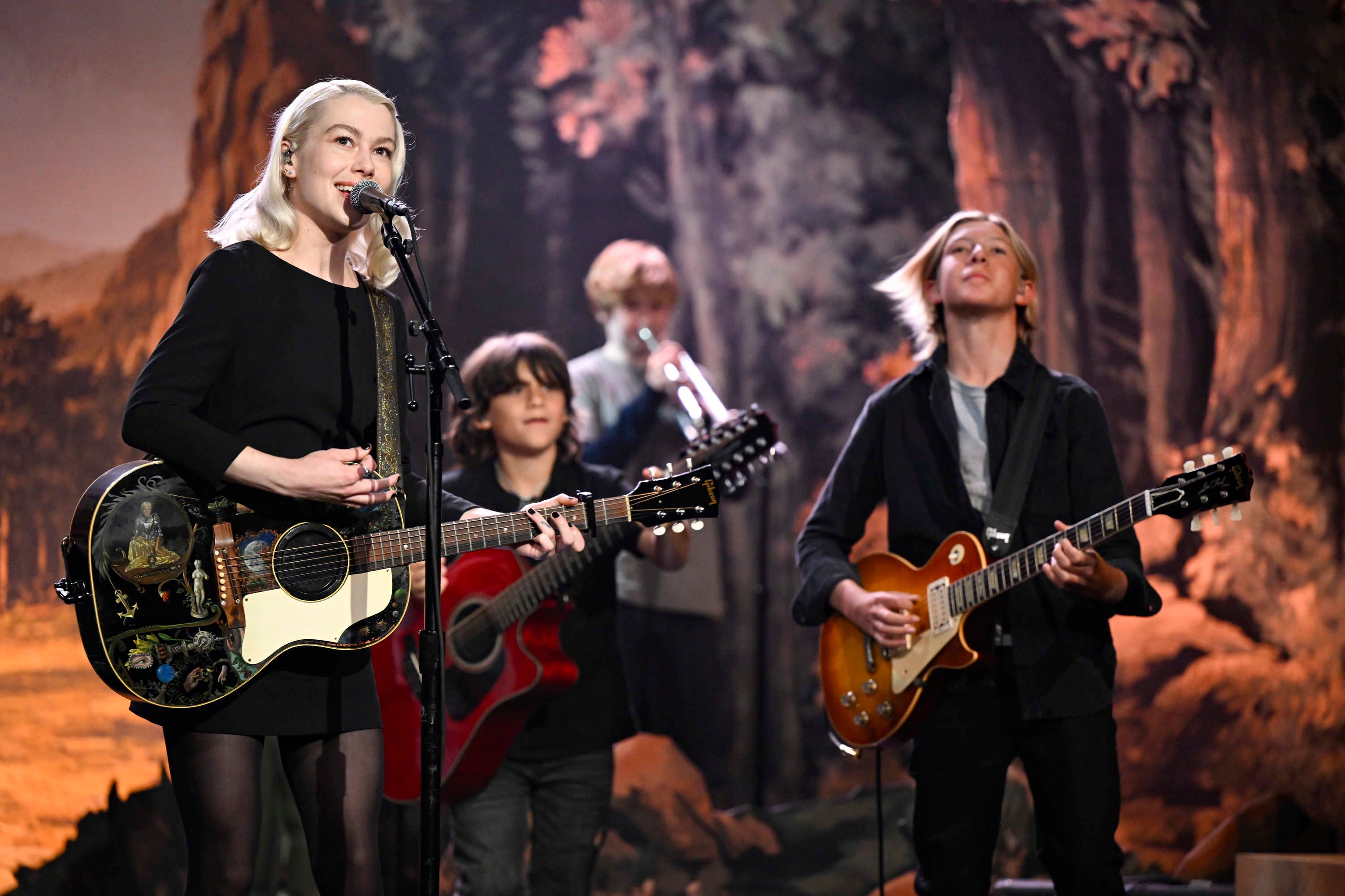 Source-feed image associated with Watch Phoebe Bridgers Perform “Lost Boys” With a Band of Children on Fallon