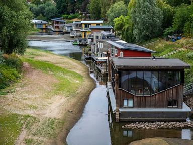 Source-feed image associated with Dry, hot summers are putting Dutch dikes at risk and threatening German river trade