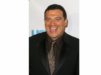 Source-feed image associated with Comedian Carlos Mencia pleads not guilty to 12 felony charges of failure to pay taxes