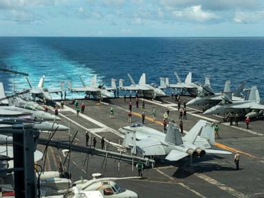 Image from linked report: 2 US Navy aviators eject while landing plane on carrier off Virginia, 4 sailors injured