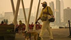 Source-feed image associated with Canada fires prompt US air quality alerts as smoke blankets major cities
