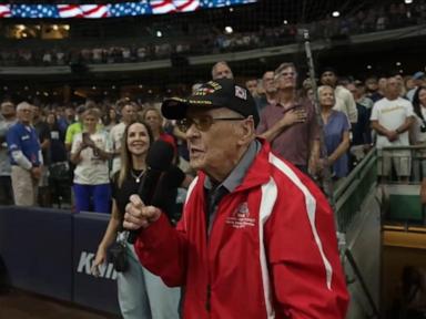 Source-feed image associated with WATCH: David Muir shares moving moment WWII veteran sings at Milwaukee Brewers game