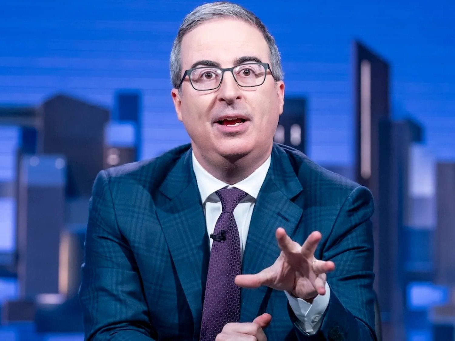 Source-feed image associated with John Oliver Embarrasses Trump Transportation Secretary Sean Duffy Over ‘Godawful’ YouTube Reality Show and ‘Real World’ Past