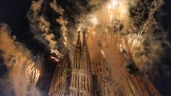 Source-feed image associated with Fireworks illuminate Barcelona's Sagrada Família during Pope visit