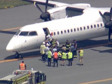 Source-feed image associated with Passengers restrain pilot during apparent medical emergency on 'terrifying' flight