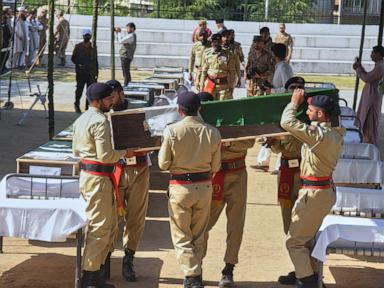 Source-feed image associated with Funeral is held for 22 Pakistani soldiers who died in a helicopter crash in Kashmir