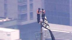 Source-feed image associated with Watch: Two people climb to highest point of Empire State Building