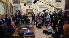 Source-feed image associated with Trump says he is banning CNN and Politico from White House
