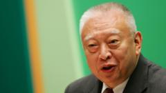Source-feed image associated with Hong Kong's first leader after British handover dies