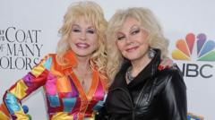 Source-feed image associated with Dolly Parton's sister pleads for end to 'AI garbage' posts after singer's death