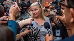 Source-feed image associated with Woman charged with juror intimidation in Lindsay Clancy trial