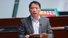 Source-feed image associated with Hong Kong activist allowed to stay in UK after deportation threat