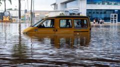 Source-feed image associated with Flooding hits Ghana's capital killing 13 people - with another storm forecast