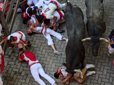 Source-feed image associated with One runner gored in the face at Spain's San Fermin bull run festival