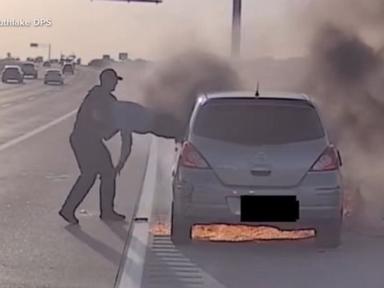 Source-feed image associated with WATCH: Officer speaks out after dramatic burning car rescue