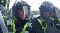 Source-feed image associated with Six more charged with violent disorder after Nowak protest