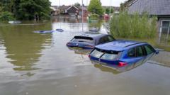 Source-feed image associated with Flash flooding risk as heavy rain hits UK