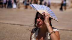 Source-feed image associated with Portugal breaks hottest May day record as Europe swelters in heatwave