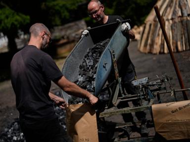 Source-feed image associated with In a German forest, 2 brothers keep the ancient tradition of charcoal burning alive