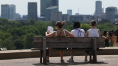 Source-feed image associated with Amber heat-health alerts issued as UK could see 10 consecutive days of temperatures over 30C