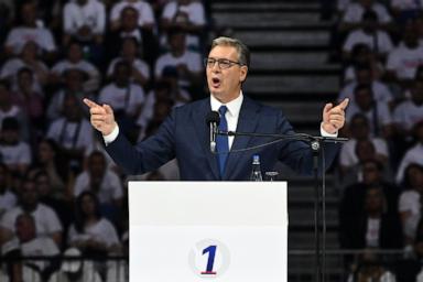 Image from linked report: Thousands pack arena in Belgrade as Serbia's leader Vucic launches prime minister bid