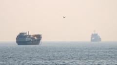 Source-feed image associated with US insists Strait of Hormuz is open as it exchanges strikes with Iran