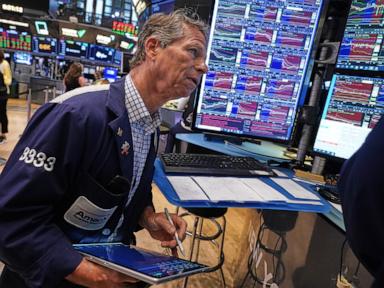 Source-feed image associated with Asian shares rally after Dow hits a record, as some AI shares bounce back