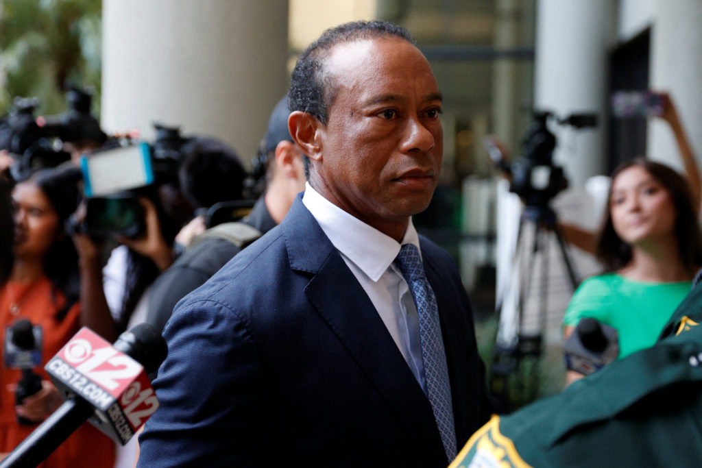 Source-feed image associated with Tiger Woods pleads no contest to reckless driving charge over rollover crash in Florida