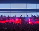 Source-feed image associated with Singapore bans Massive Attack for showing Palestinian flag, breaching ban on foreign emblems